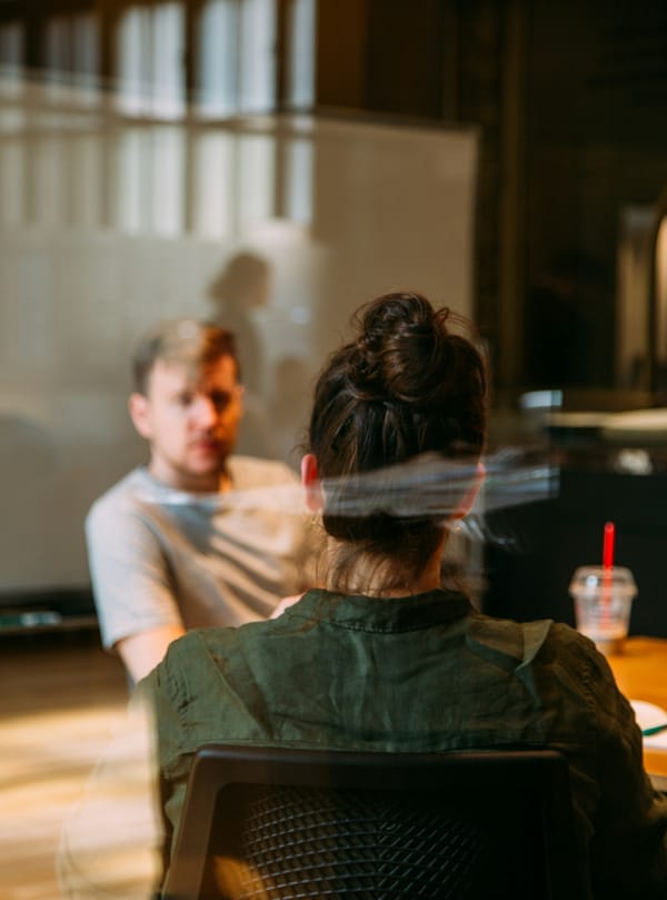 Two HR managers discuss the employee lifecycle