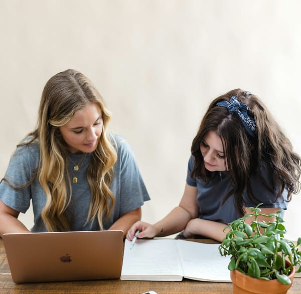 A new manager works with an employee